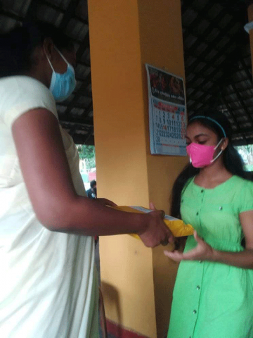 Thalapathpitiya Rural Development Society General Meeting and in parallel donating school books(2022-02-26)