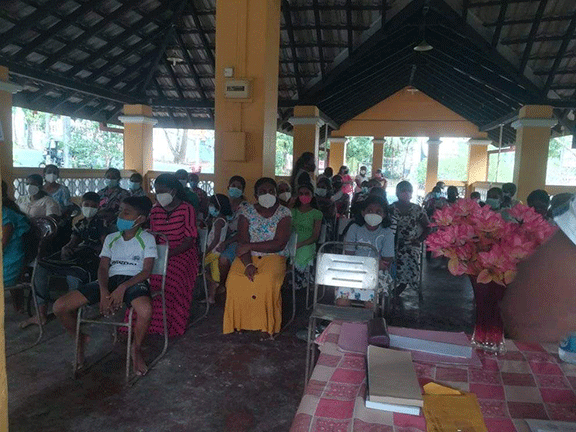 Thalapathpitiya Rural Development Society General Meeting and in parallel donating school books(2022-02-26)
