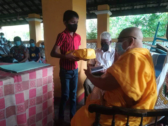 Thalapathpitiya Rural Development Society General Meeting and in parallel donating school books(2022-02-26)