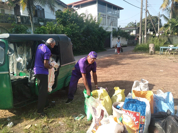 496 Kottawa South  Clean up the area around the Grama niladari officer's office and the society's grounds and conduct garbage collection